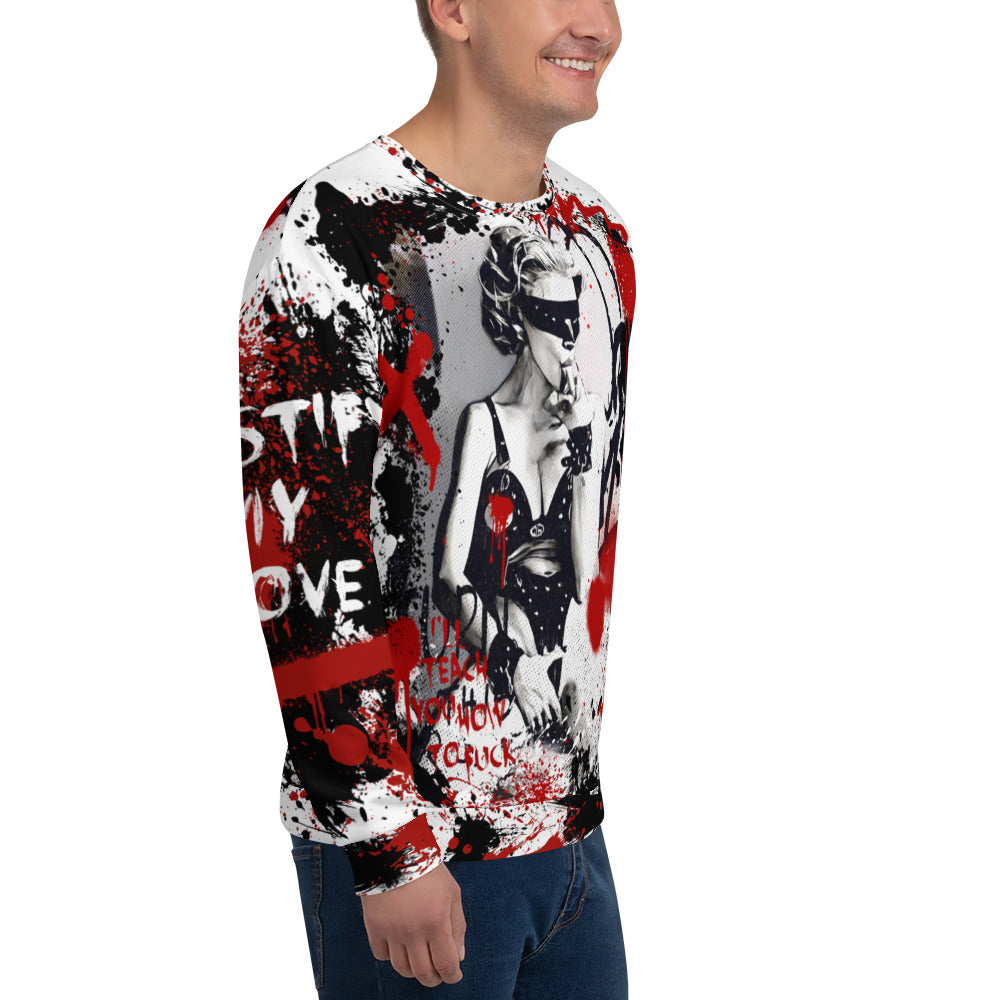 Unleash your rebellious side with the 'I'll Teach You How To Fuck' unisex sweatshirt, featuring an artist rendering of Madonna and striking black, white, and red graffiti inspired by the Justify My Love era. Make a fierce fashion statement with this distinctive sweatshirt.