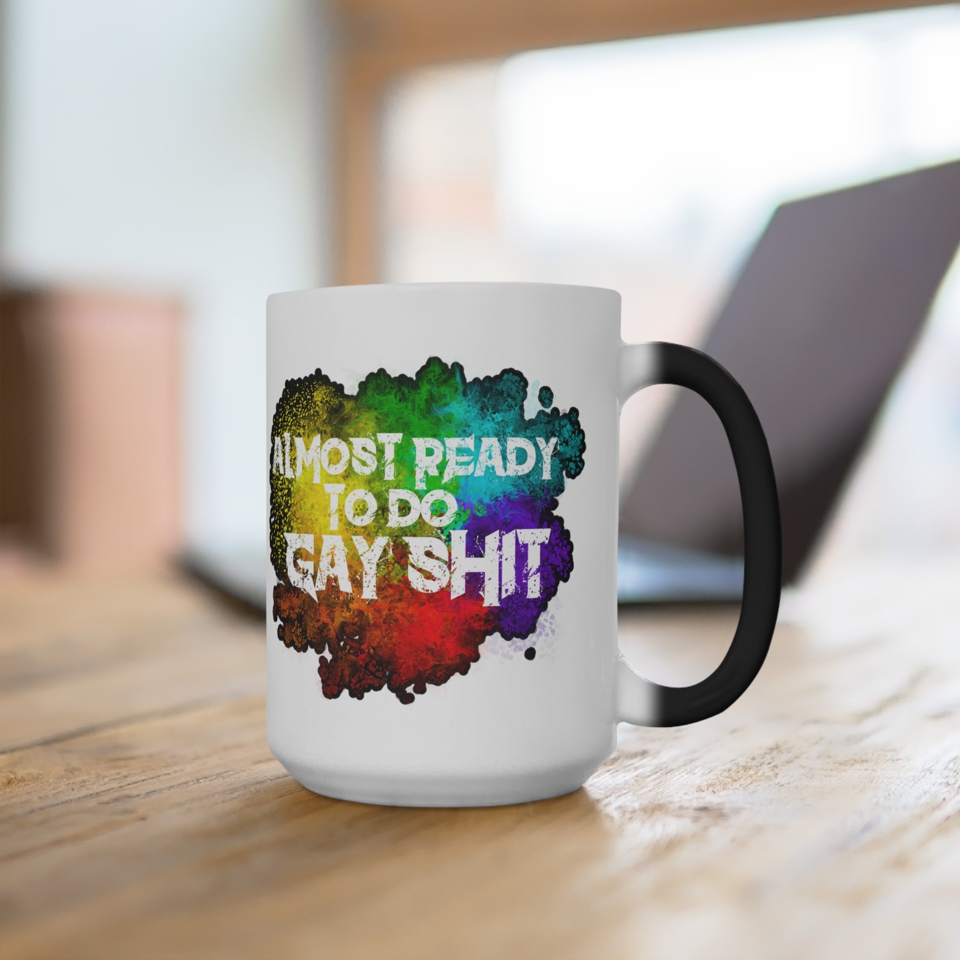 Add a touch of pride to your mornings with the 'Almost Ready To Do Gay Shit' 11oz color-changing mug from Moody Booty Apparel. This LGBTQ-themed coffee mug brings joy as it transforms colors with the warmth of your beverage. Start the day with a vibrant reminder of inclusivity.